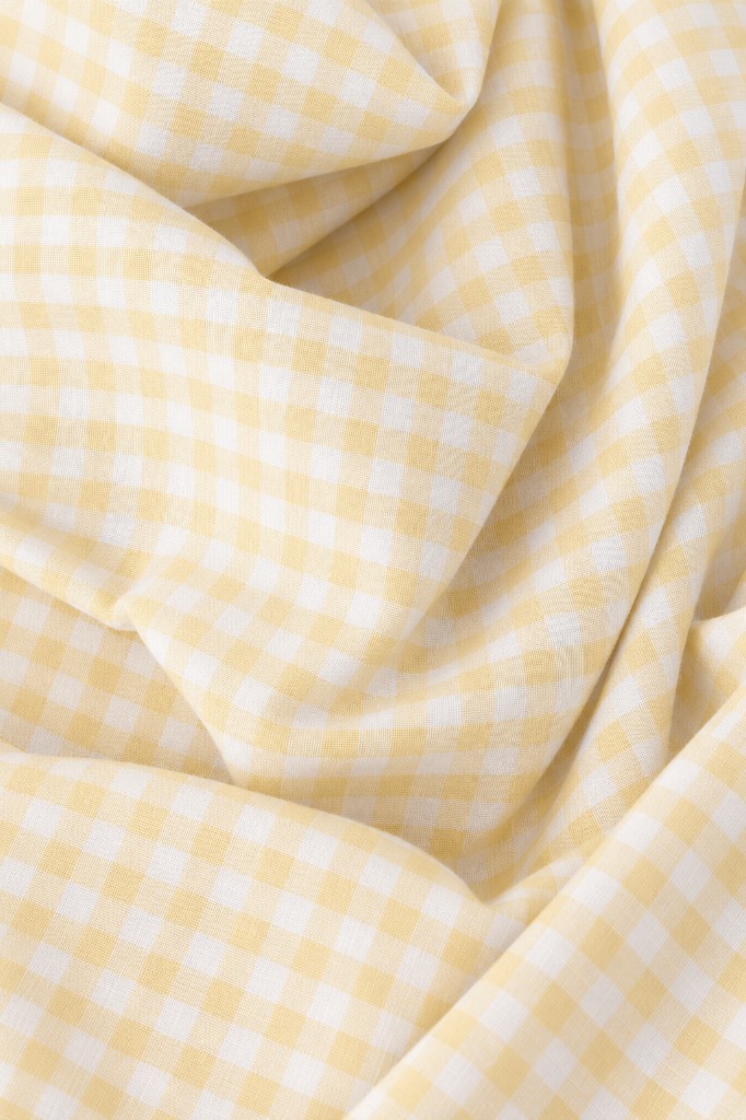 Close-up of Florence Active butter gingham organic cotton fabric
