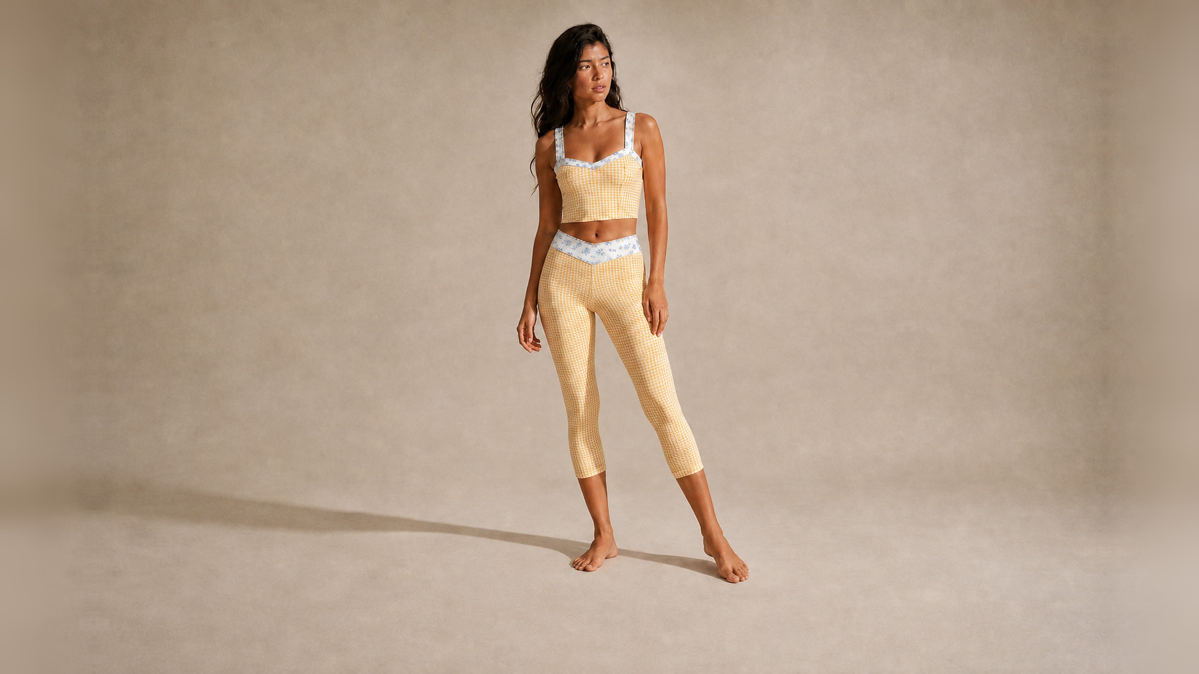 Model in the Florence Active butter gingham set, full-length studio shot