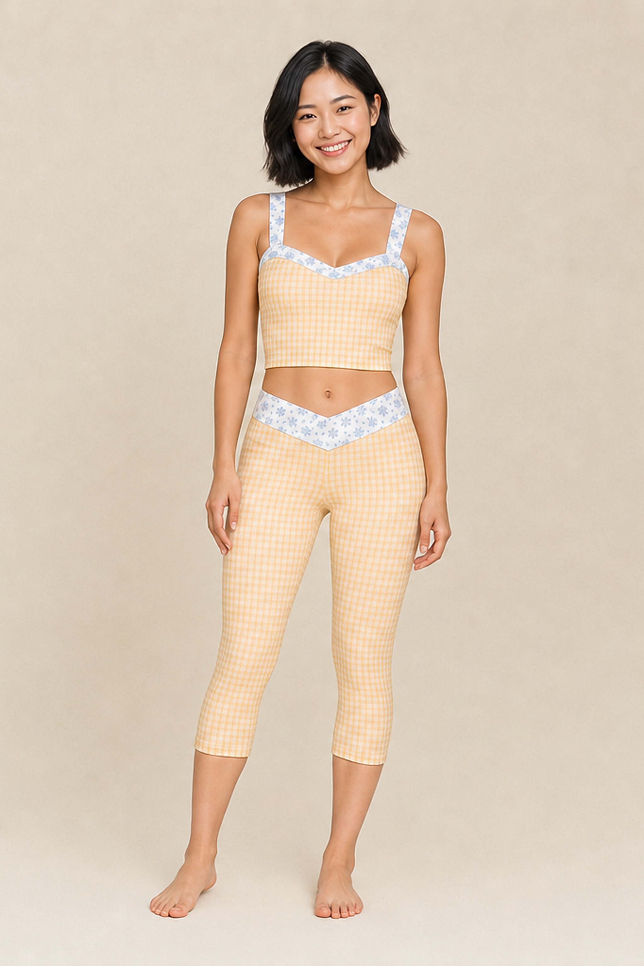 Sofia wearing the Butter Gingham Set in size XS